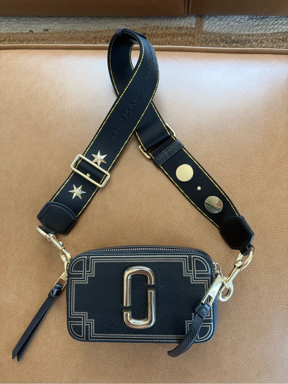The Marc Jacobs Black Snapshot Camera Bag with Gold Hardware